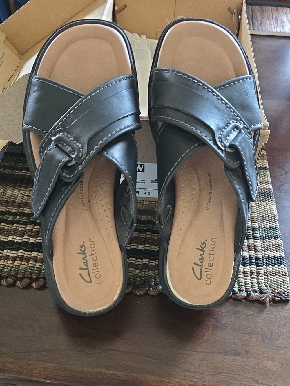 Clarks Black Leather Crossover Slide Mules with Tan Insole